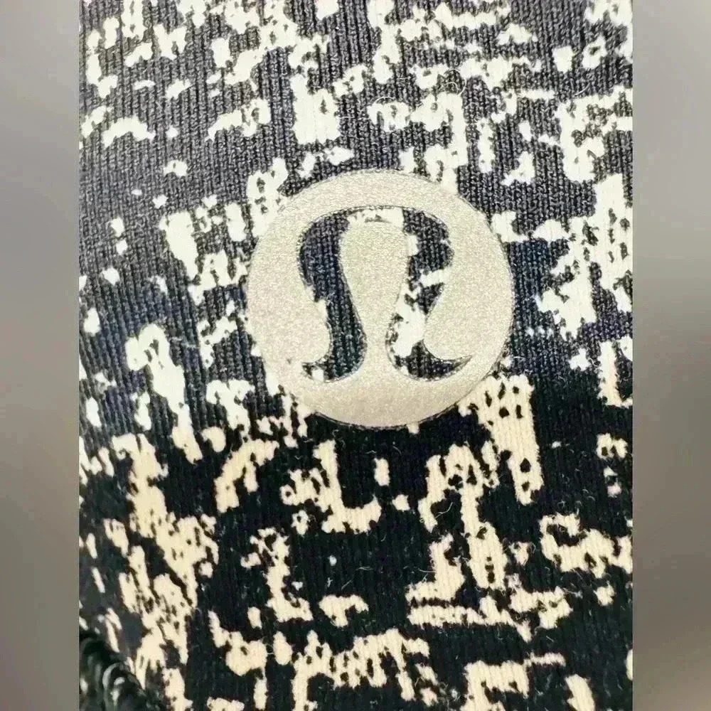 Lululemon Energy Bra
Medium support, B-D cups, black with white spots, size 4 - Picture 7 of 8